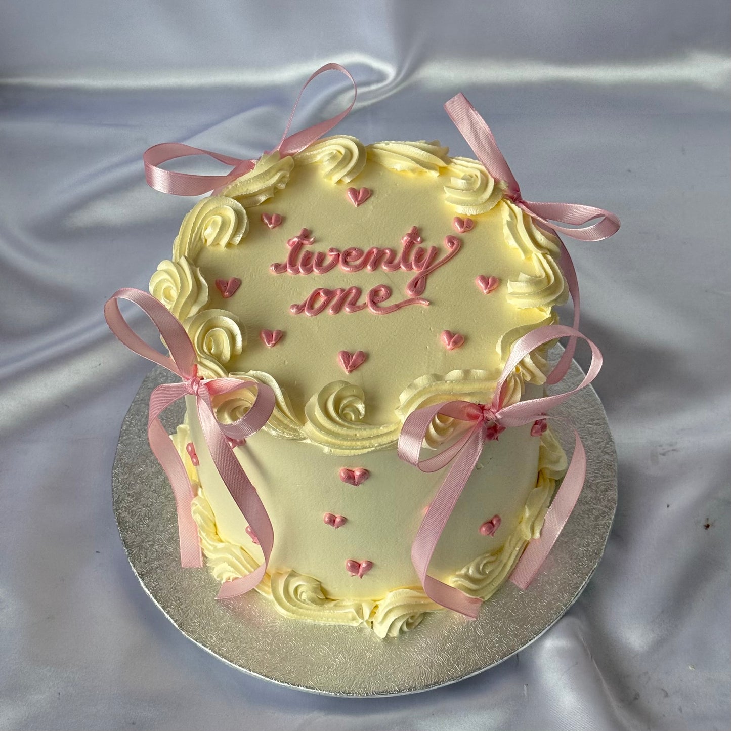 White Round with Light Pink Ribbons π