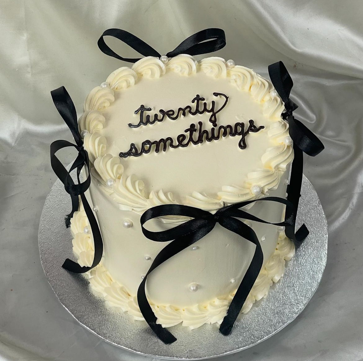 White Round with Ribbons π